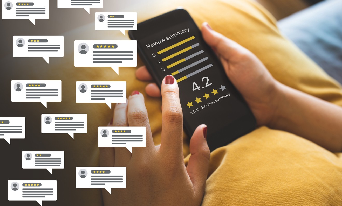 Consumer reviews concepts with bubble people review comments and smartphone. rating or feedback
